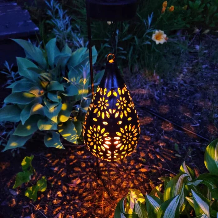 Lanterne solaire ajourée à motif floral
