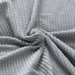 Housse de canapé extensible en maille gaufrée