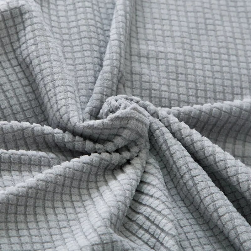 Housse de canapé extensible en maille gaufrée