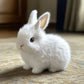 Lapin interactif en peluche avec sons et mouvements