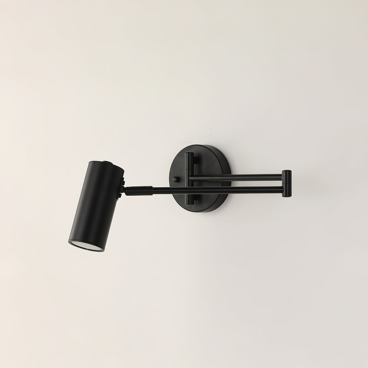 Applique de lecture à bras articulé et tête orientable