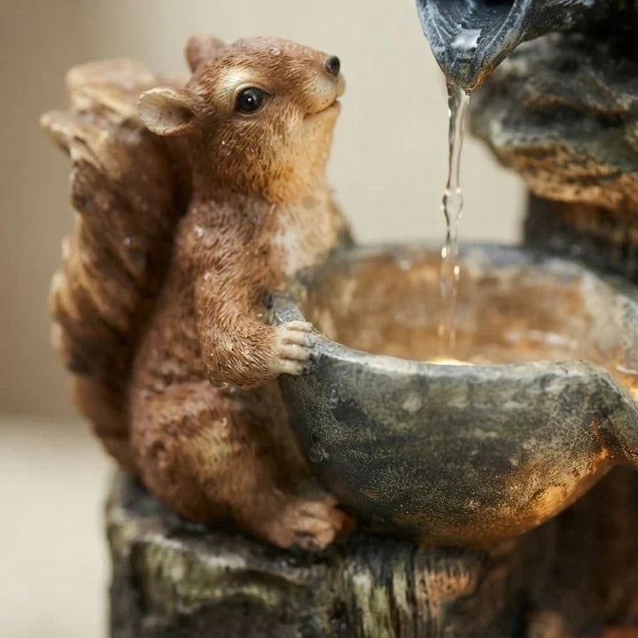 Fontaine décorative avec figurine animale et éclairage