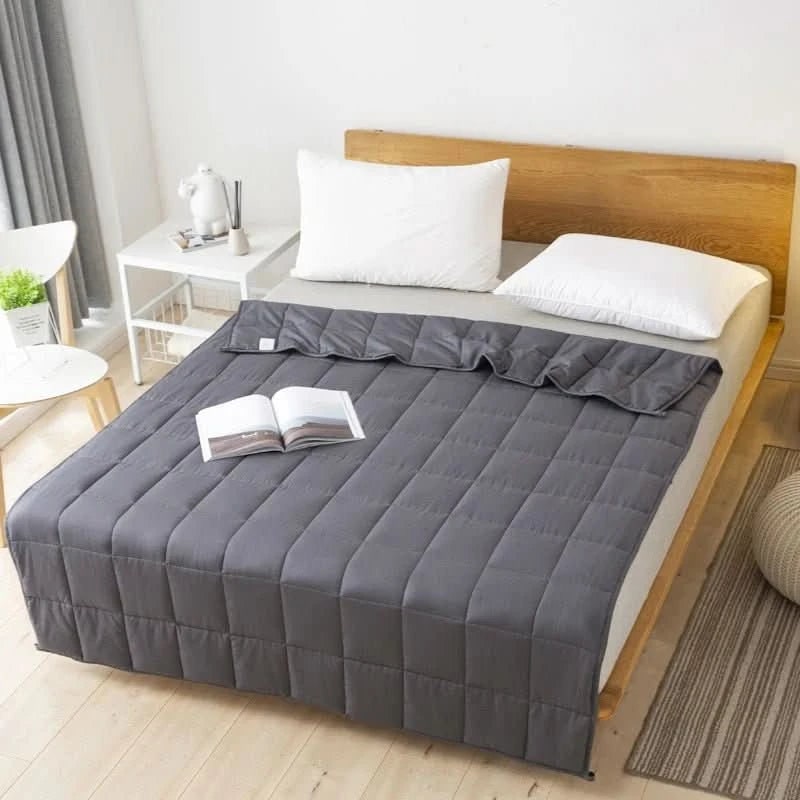 Couverture lestée en coton matelassé à billes de verre