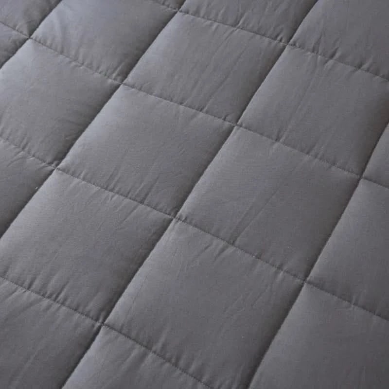 Couverture lestée en coton matelassé à billes de verre