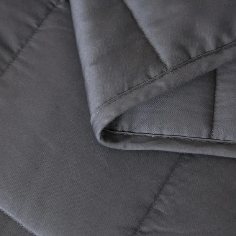 Couverture lestée en coton matelassé à billes de verre