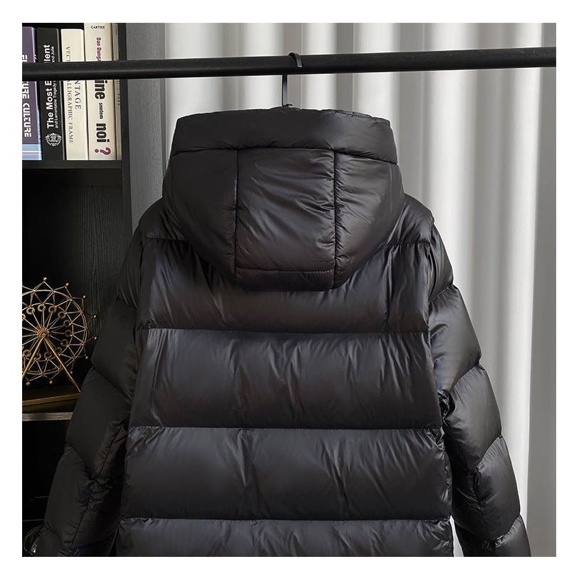 Doudoune noire longue pour femme avec capuche
