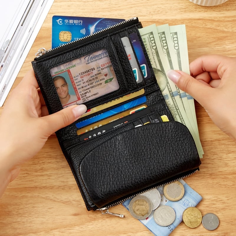 Portefeuille femme en cuir avec poches zippées et porte-cartes
