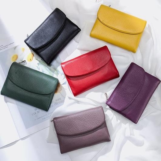 Portefeuille femme en cuir avec poches zippées et porte-cartes