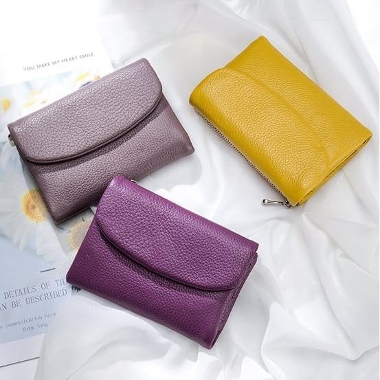 Portefeuille femme en cuir avec poches zippées et porte-cartes