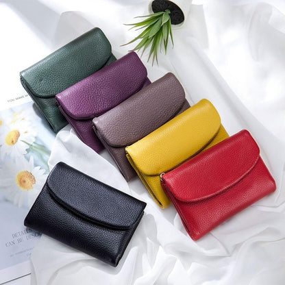 Portefeuille femme en cuir avec poches zippées et porte-cartes
