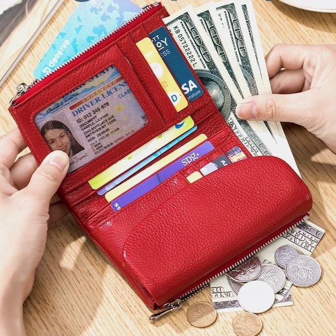 Portefeuille femme en cuir avec poches zippées et porte-cartes