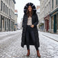 Manteau matelassé long pour femme avec capuche et ceinture