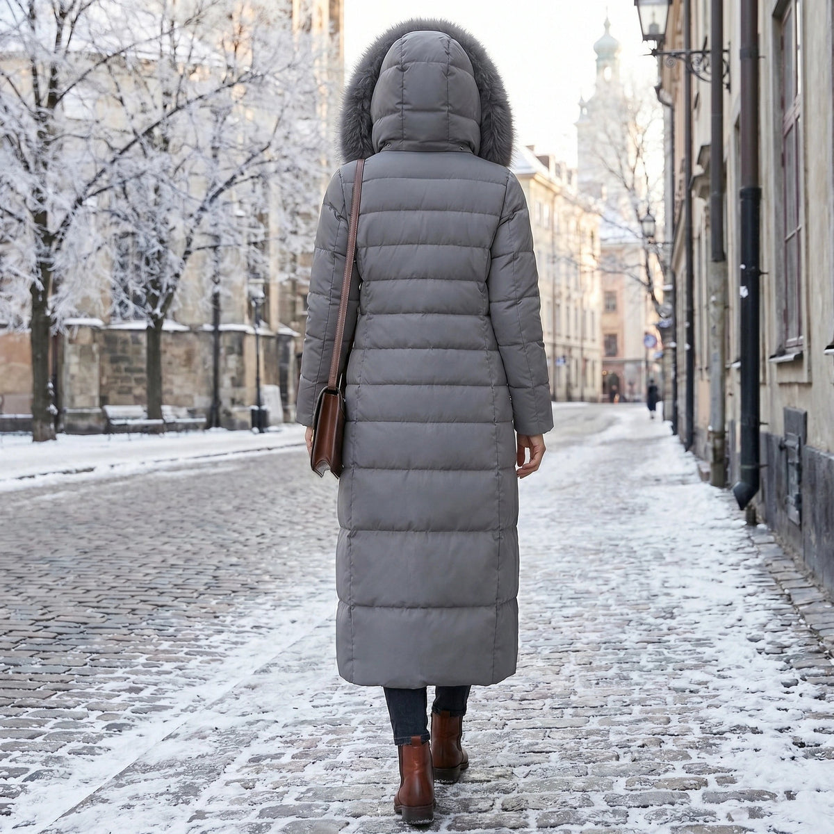 Manteau matelassé long pour femme avec capuche et ceinture
